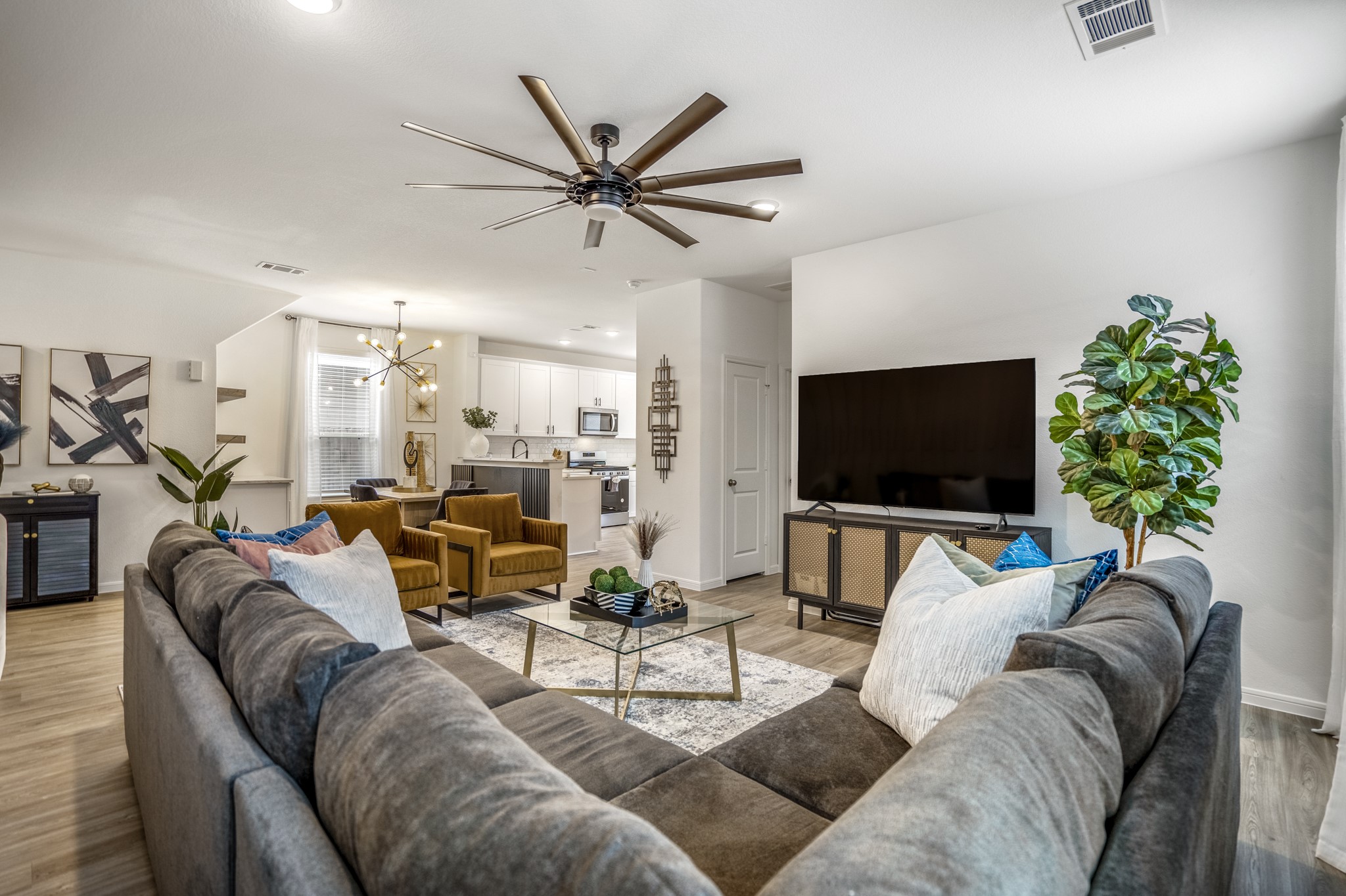 10477 Pineland Drive Willis, TX 77378 - Photo 6 of 27 a living room with furniture and a flat screen tv