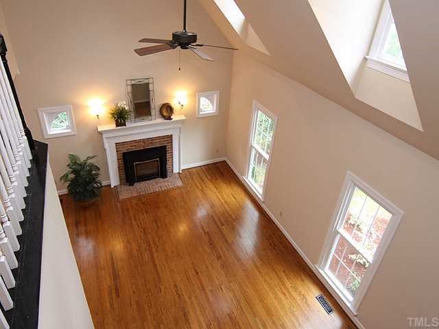 4303 Swarthmore Road Durham, NC 27707 - Photo 3 of 12 Another view of the living room from the second story loft - the new front windows and the skylights provide an abundance of natural light.