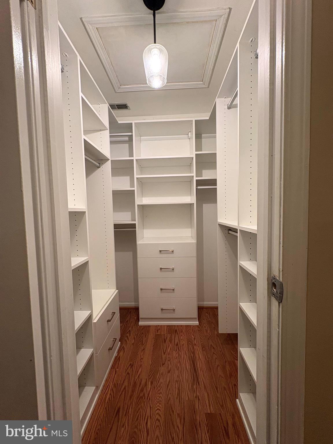 263 Tavistock Cherry Hill, NJ 08034 - Photo 22 of 33 a view of walk in closet with empty racks