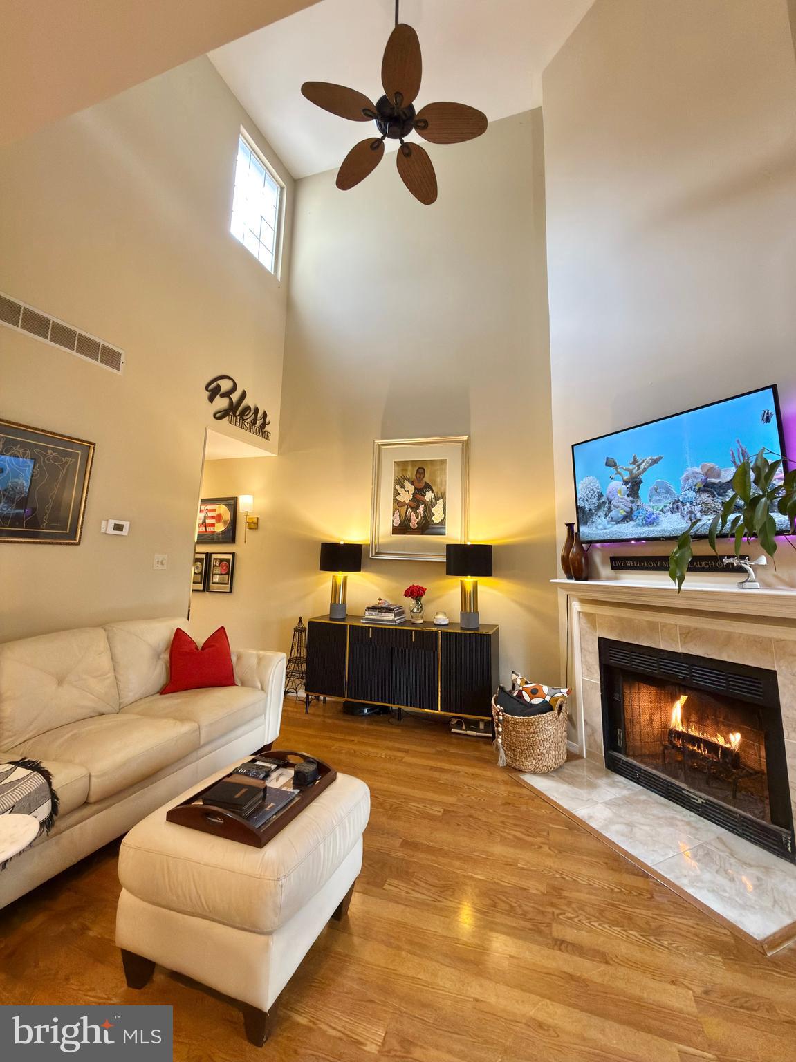 263 Tavistock Cherry Hill, NJ 08034 - Photo 6 of 33 a living room with furniture and a fireplace