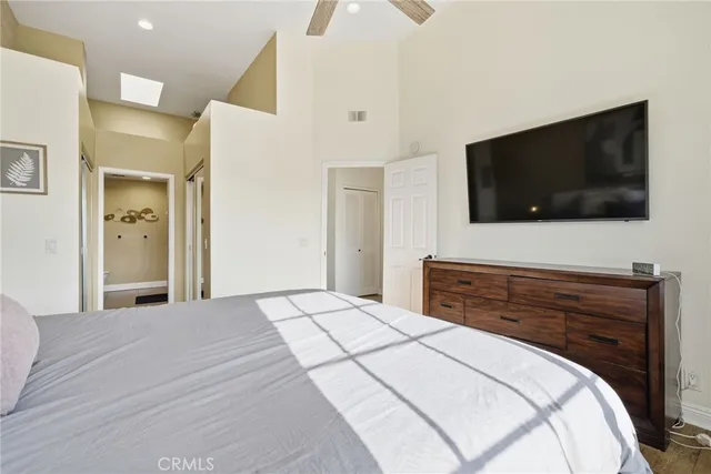 a bathroom with a tub shower and sink
