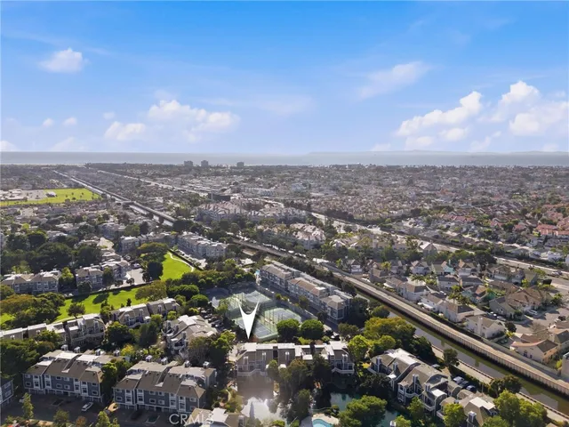 a vase of flowers sitting on a floor