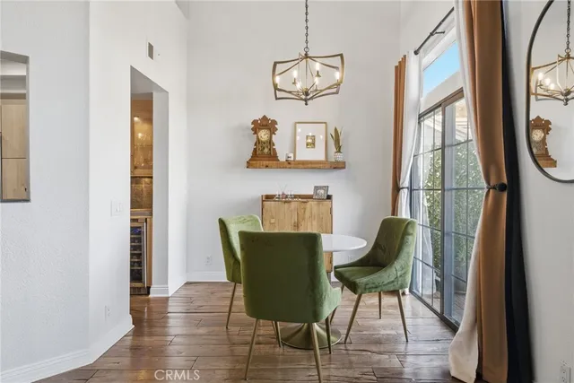 a kitchen with granite countertop a sink stainless steel appliances and cabinets