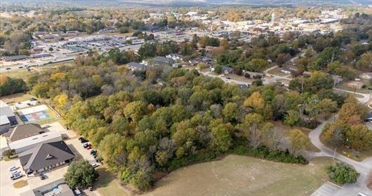 511 South Baker Street Lindale, TX 75771 - Photo 7 of 10 an aerial view of residential house with parking space