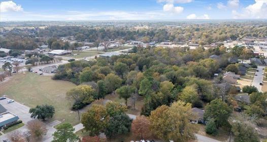 511 South Baker Street Lindale, TX 75771 - Photo 9 of 10 an aerial view of multiple house