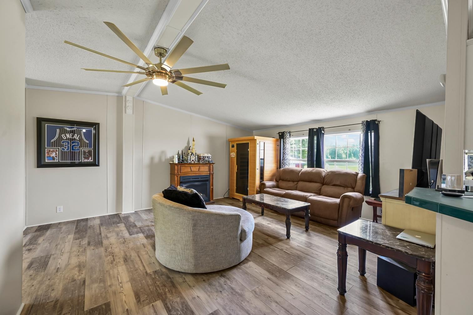 6439 Cedar Grove Road Big Sandy, TN 38221 - Photo 5 of 38 a living room with furniture and a flat screen tv