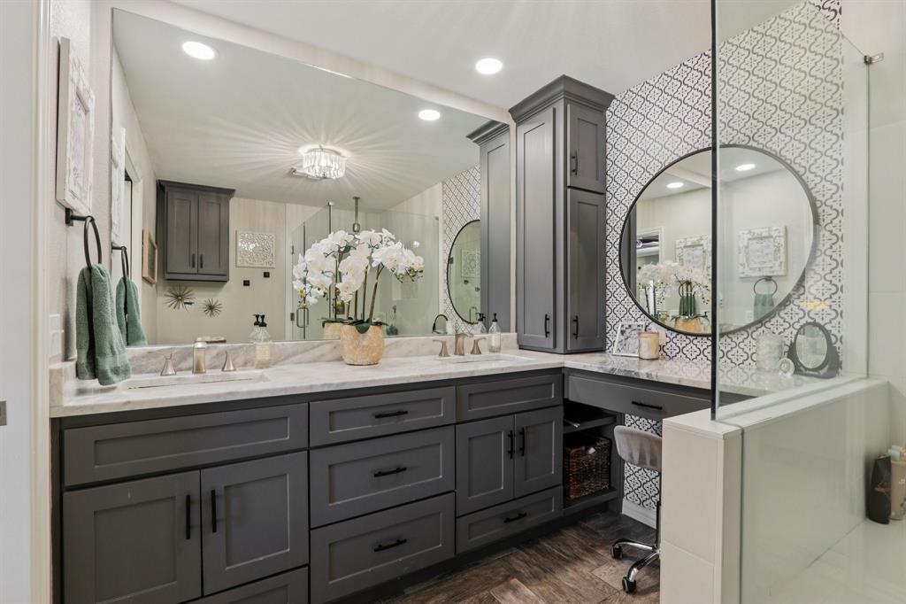149 South Moore Road Coppell, TX 75019 - Photo 20 of 40 a bathroom with a double vanity sink and a mirror