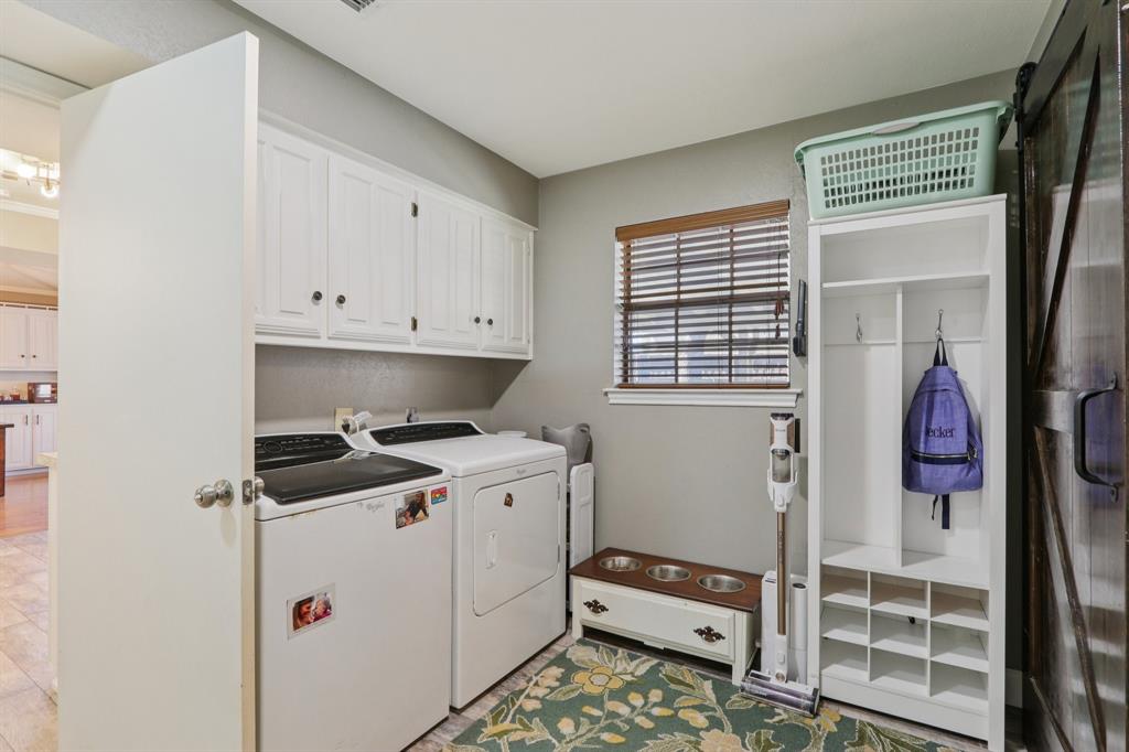 149 South Moore Road Coppell, TX 75019 - Photo 29 of 40 a room with storage and utility