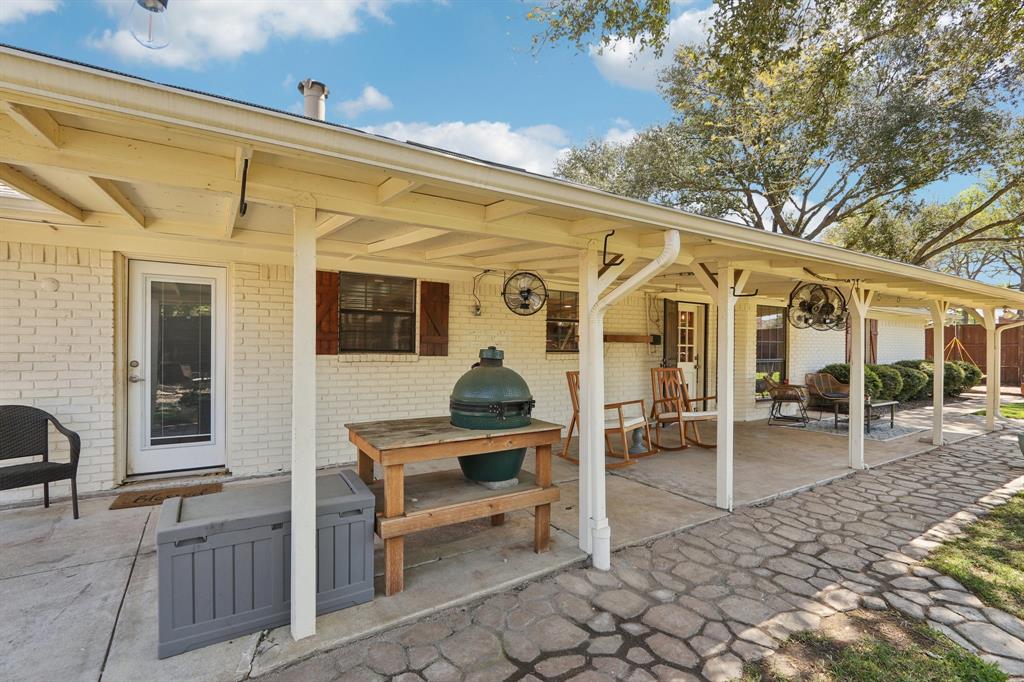 149 South Moore Road Coppell, TX 75019 - Photo 31 of 40 a front view of a building with outdoor seating