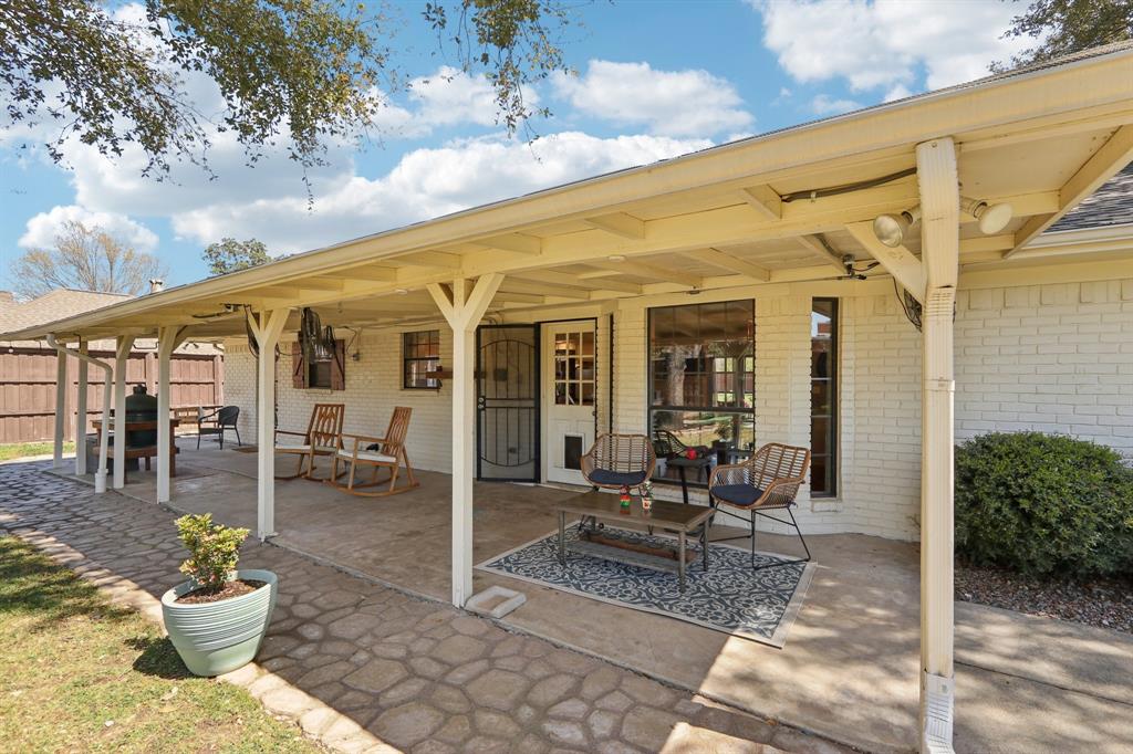 149 South Moore Road Coppell, TX 75019 - Photo 32 of 40 a building outdoor space with patio furniture and potted plants