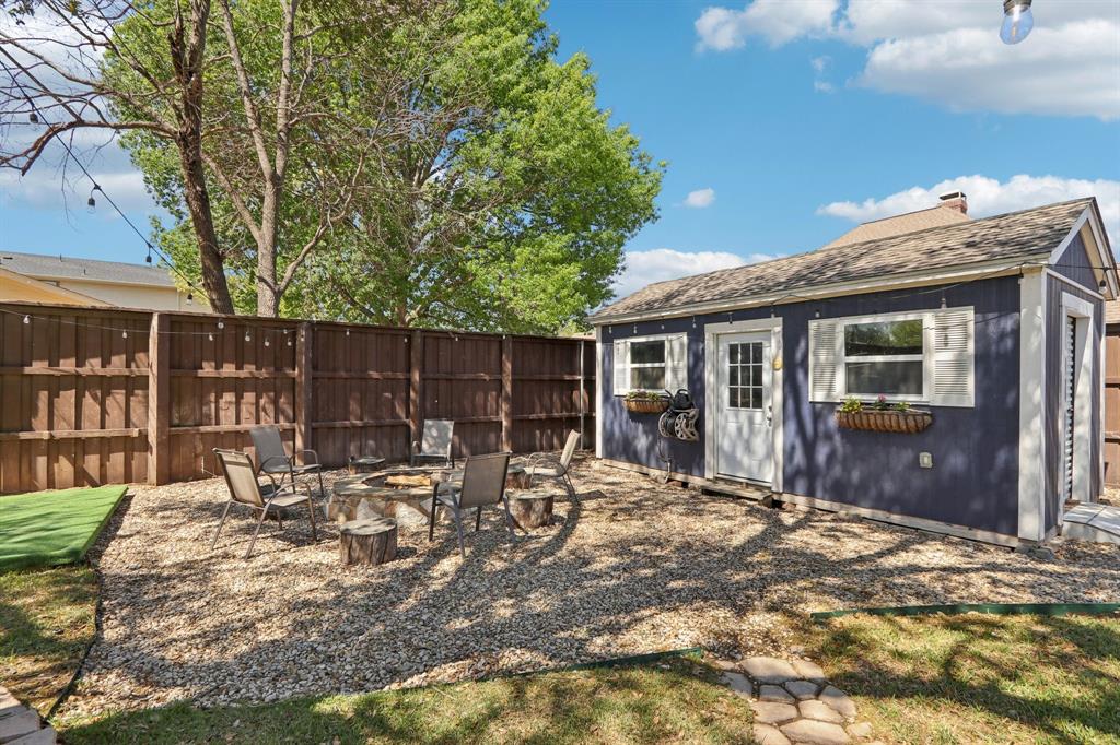 149 South Moore Road Coppell, TX 75019 - Photo 34 of 40 a view of a house with backyard outdoor seating area