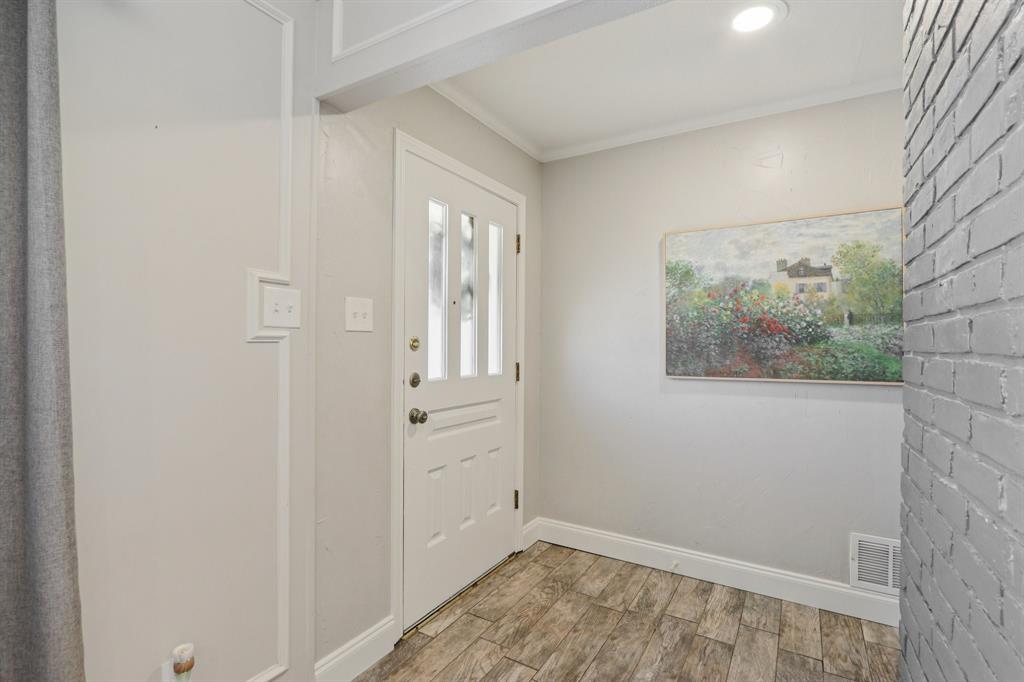 149 South Moore Road Coppell, TX 75019 - Photo 4 of 40 wooden floor in an empty room