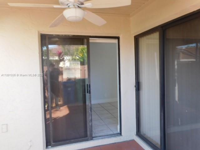 17038 Northwest 66th Court Hialeah, FL 33015 - Photo 21 of 27 Sliding door to patio