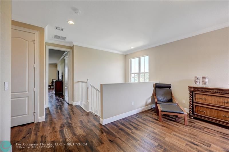 8631 Lakeside Bend Parkland, FL 33076 - Photo 30 of 71 a view of a livingroom with wooden floor and furniture