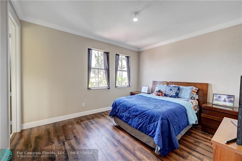 8631 Lakeside Bend Parkland, FL 33076 - Photo 39 of 71 a bedroom with bed and window