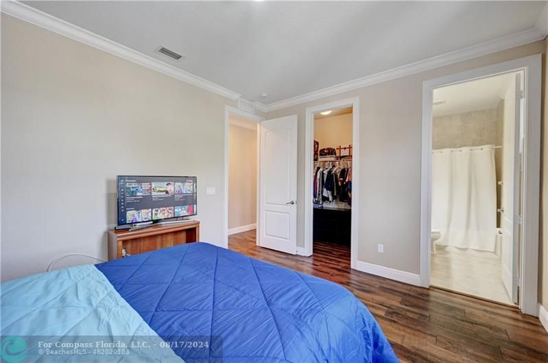 8631 Lakeside Bend Parkland, FL 33076 - Photo 40 of 71 a bedroom with a bed and a dresser