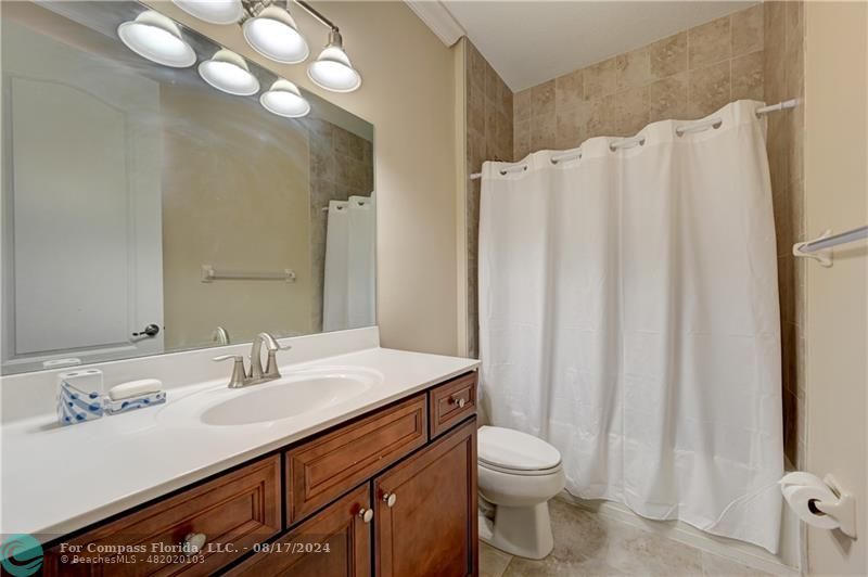 8631 Lakeside Bend Parkland, FL 33076 - Photo 41 of 71 a bathroom with a sink toilet and shower