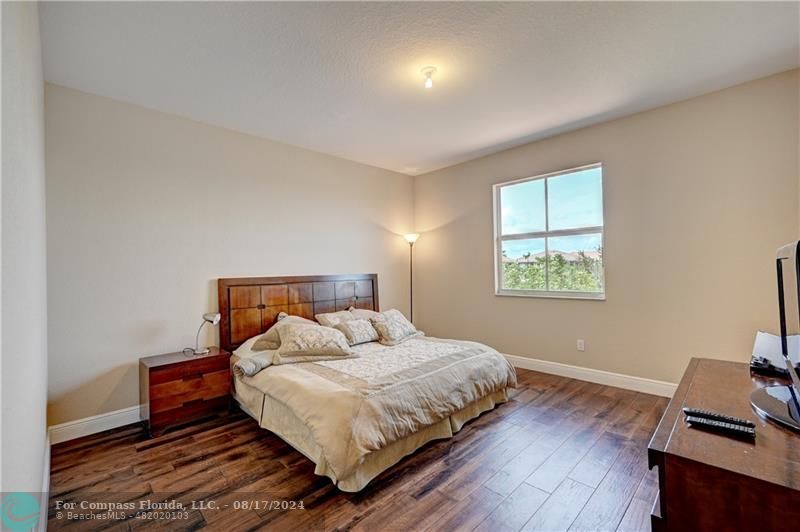 8631 Lakeside Bend Parkland, FL 33076 - Photo 45 of 71 a bedroom with bed and a window