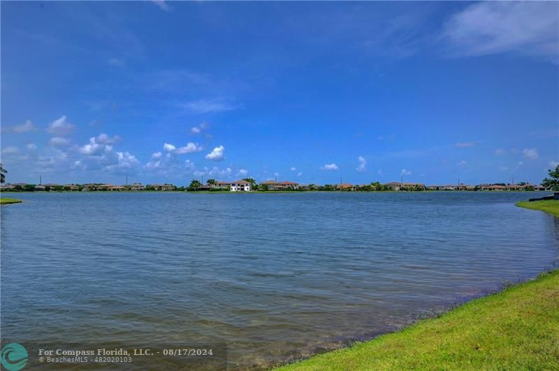 8631 Lakeside Bend Parkland, FL 33076 - Photo 57 of 71 a view of a lake from a yard
