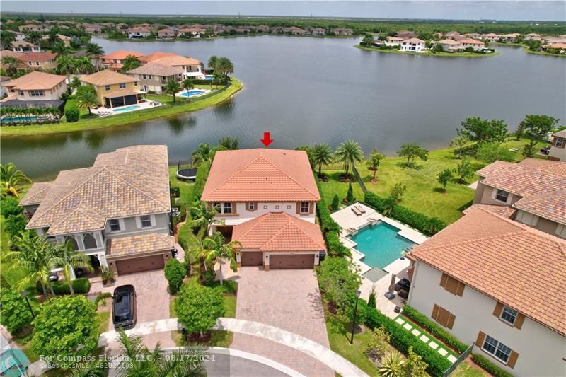 8631 Lakeside Bend Parkland, FL 33076 - Photo 64 of 71 an aerial view of a house with a lake view