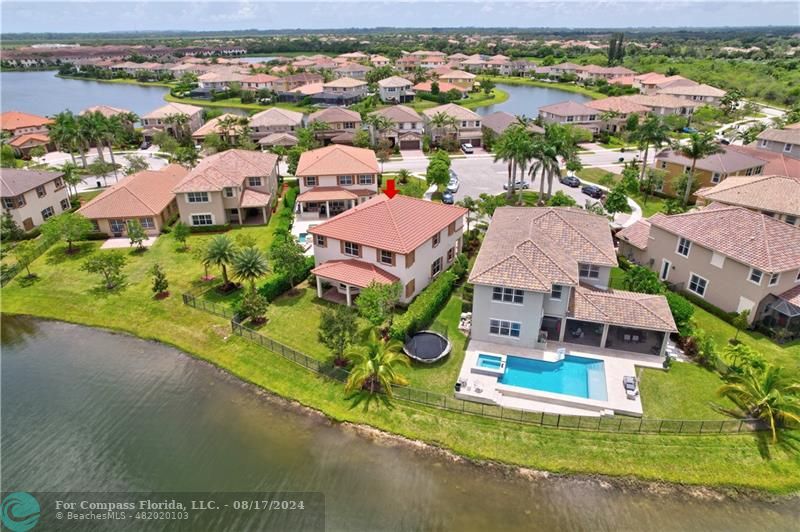 8631 Lakeside Bend Parkland, FL 33076 - Photo 68 of 71 an aerial view of residential houses with outdoor space and parking