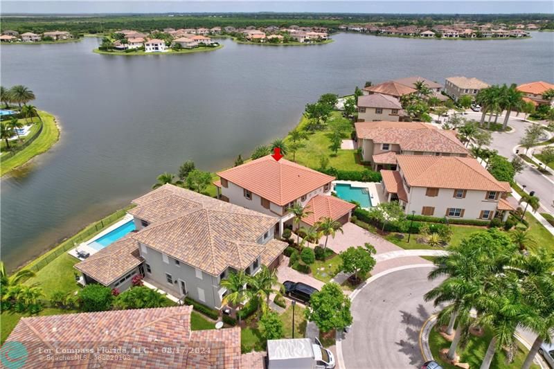 8631 Lakeside Bend Parkland, FL 33076 - Photo 69 of 71 an aerial view of a house with a lake view