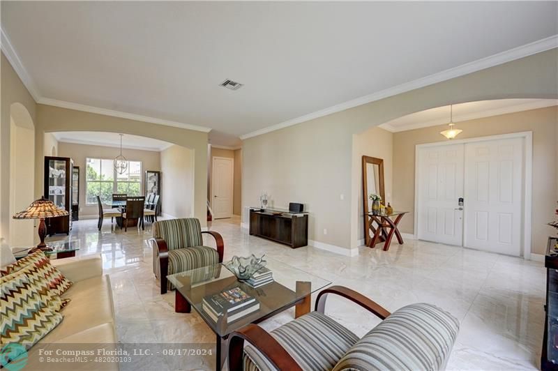 8631 Lakeside Bend Parkland, FL 33076 - Photo 7 of 71 a living room with furniture and wooden floor