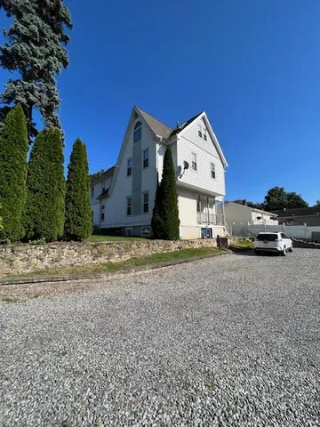 a view of a truck parked in front of a house