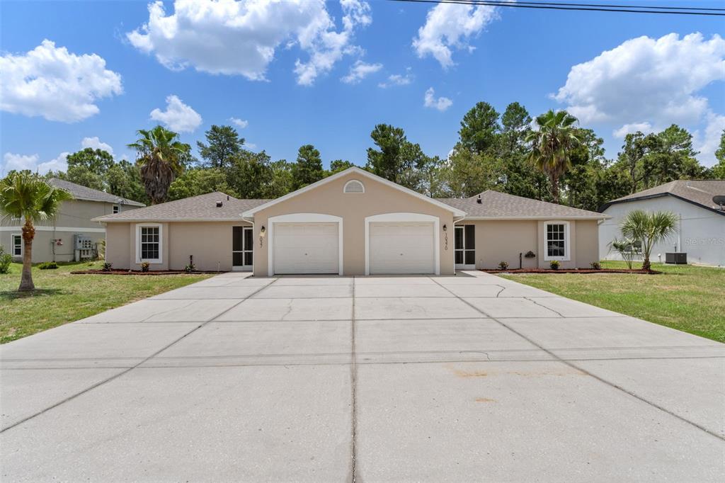 10370 Sandlor Street Spring Hill, FL 34608 - Photo 4 of 61