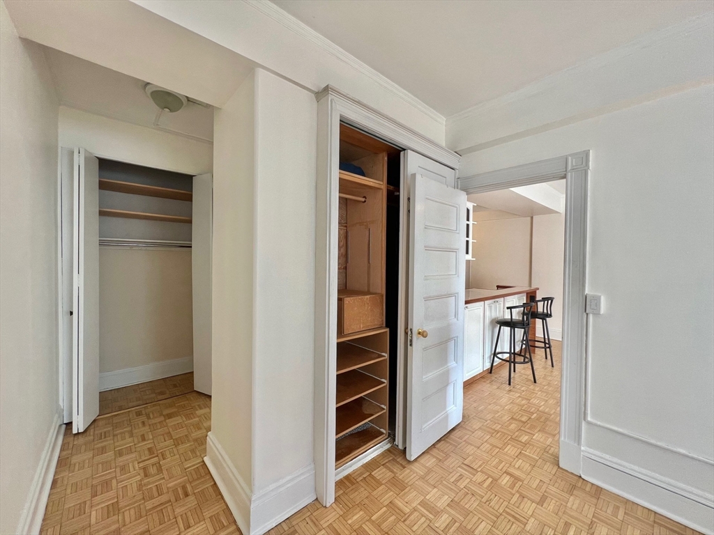 21 Beacon Street, Unit 6T Boston, MA 02108 - Photo 12 of 28 a view of a hallway with kitchen and entryway
