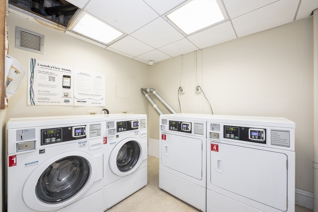 21 Beacon Street, Unit 6T Boston, MA 02108 - Photo 16 of 28 a utility room with dryer and washer