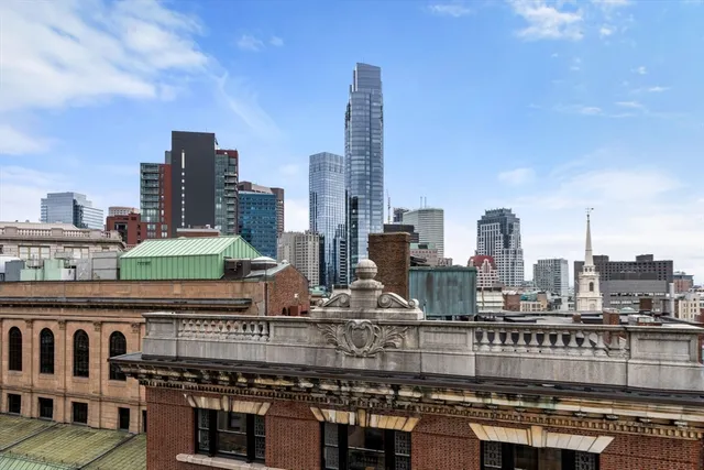 a view of a city with tall buildings