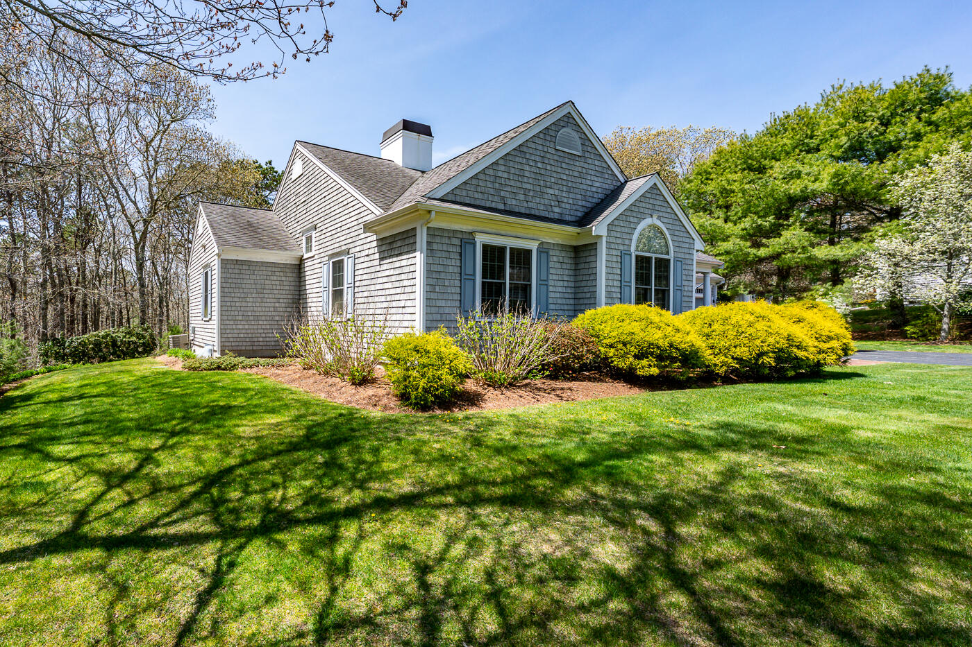 69 Regatta Drive Mashpee, MA 02649 - Photo 1 of 31 front view of a house with a yard