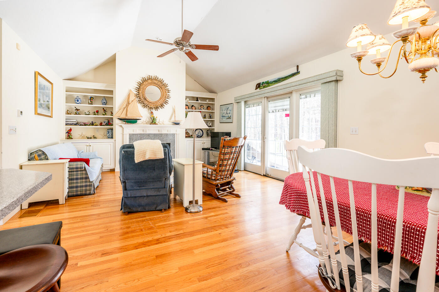 69 Regatta Drive Mashpee, MA 02649 - Photo 11 of 31 a living room with furniture and a large window