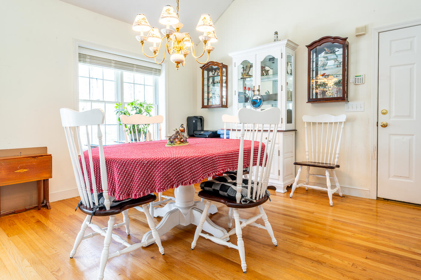 69 Regatta Drive Mashpee, MA 02649 - Photo 12 of 31 a living room with furniture flowerpot and wooden floor