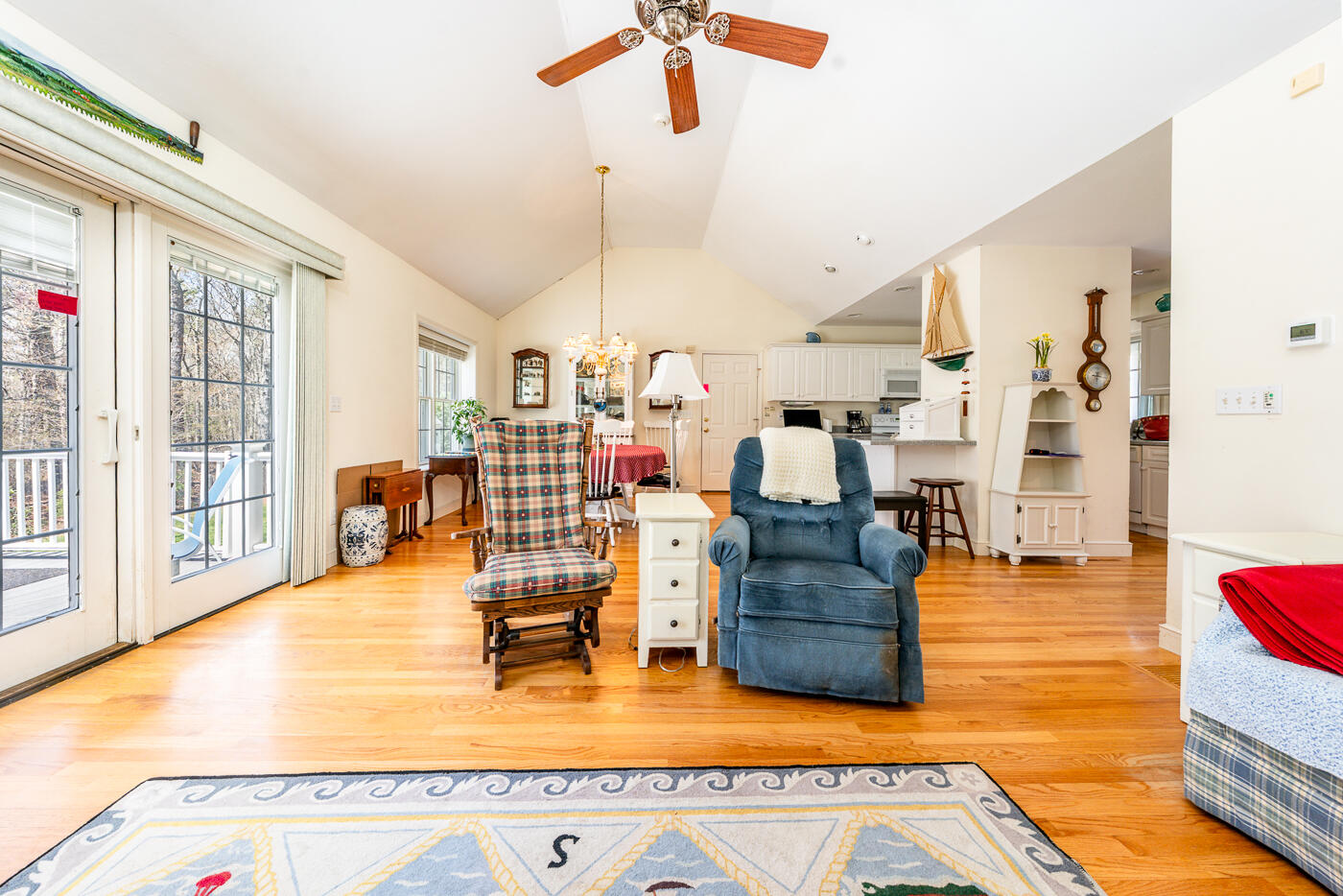 69 Regatta Drive Mashpee, MA 02649 - Photo 10 of 31 a living room with furniture and a wooden floor