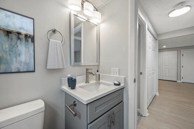 64 Goldthwaite Road, Unit 10 Worcester, MA 01605 - Photo 8 of 13 a bathroom with a sink and a mirror