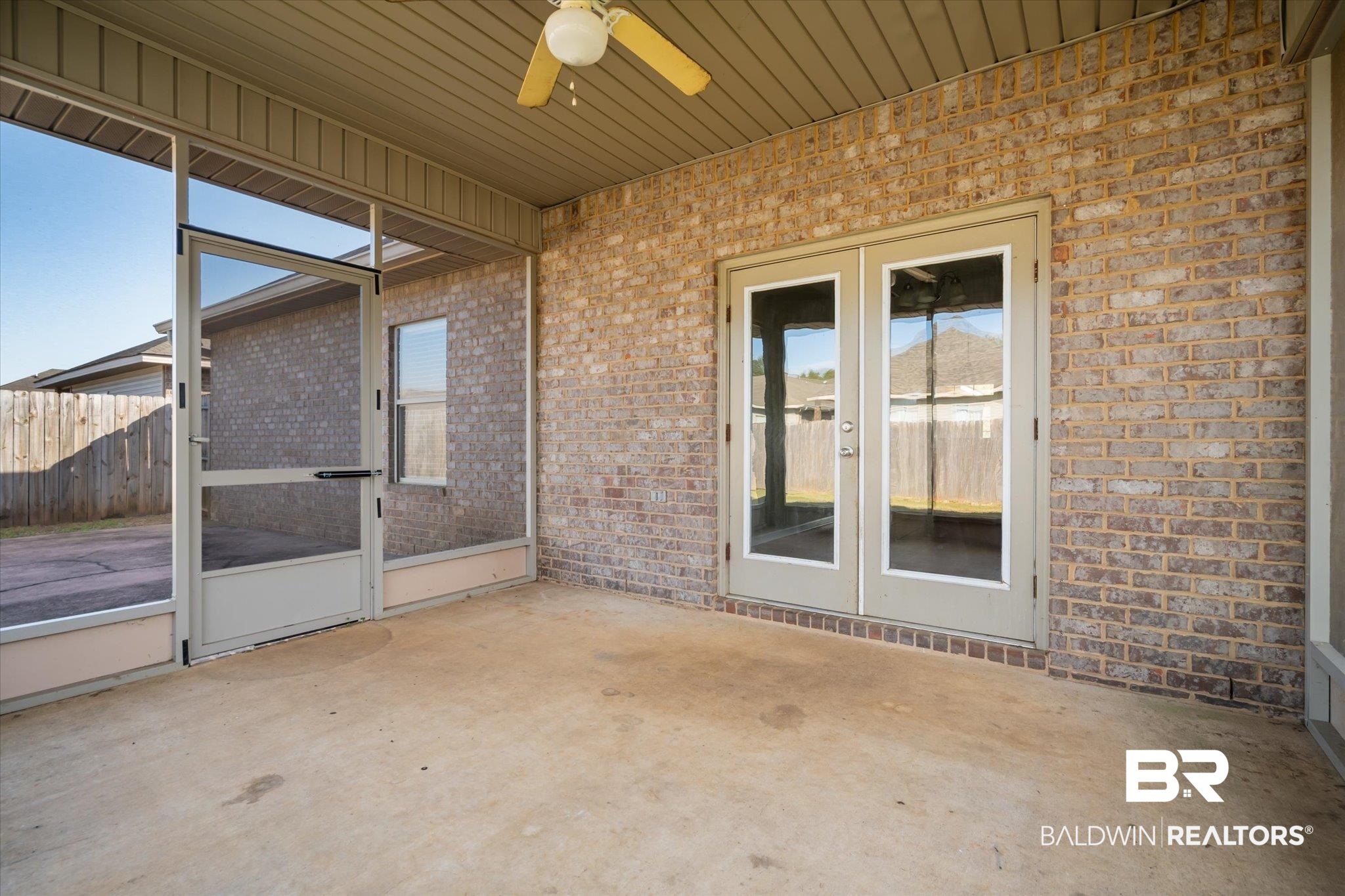 10251 Fionn Loop Daphne, AL 36526 - Photo 20 of 28 Unfurnished sunroom with ceiling fan and wood ceiling