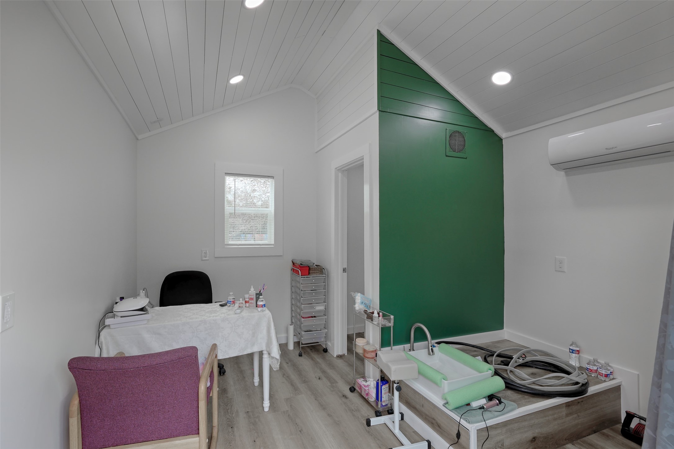 2373 Crockett Martin Road Conroe, TX 77306 - Photo 22 of 34 Inside the little Cottage. Currently set up as a private nail salon. With water and a half bathroom.