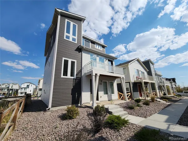 a front view of a house with entertaining space
