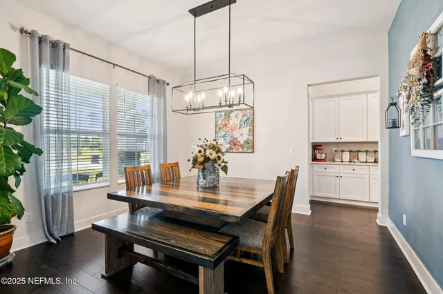 a kitchen with sink and window