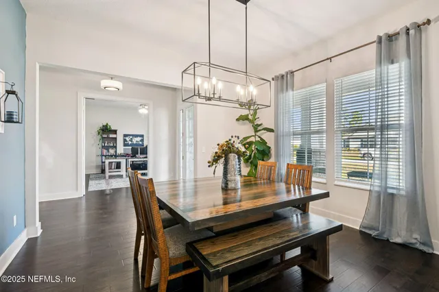 a kitchen with stainless steel appliances white cabinets and a stove a oven