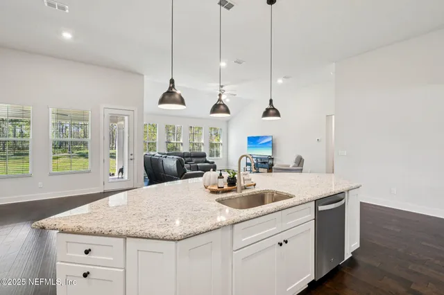 a spacious bathroom with a bathtub and next to a window