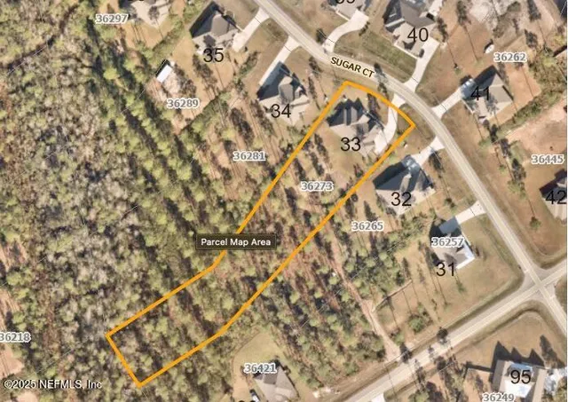 a view of house that has a swimming pool