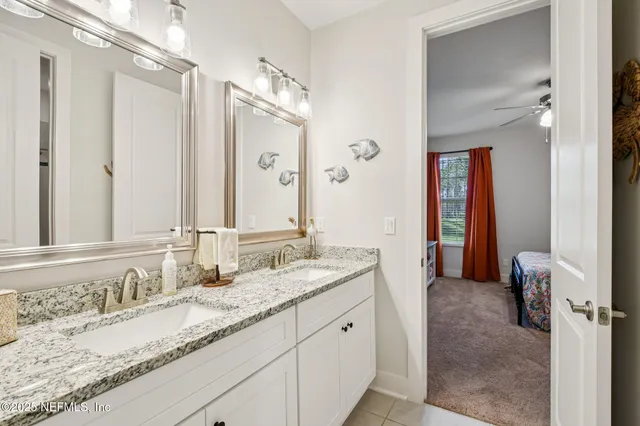 an aerial view of residential house with pool