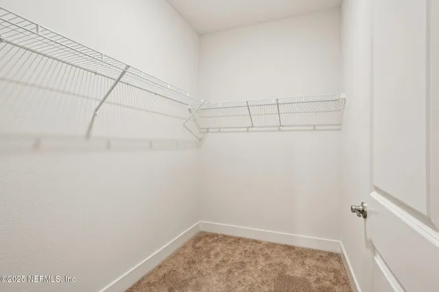 a house with swimming pool in front of it