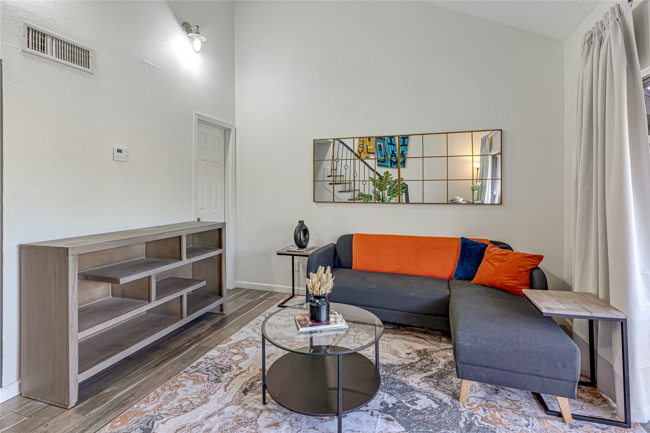 12900 Walden Road, Unit 502E Montgomery, TX 77356 - Photo 13 of 31 a room with furniture and a rug