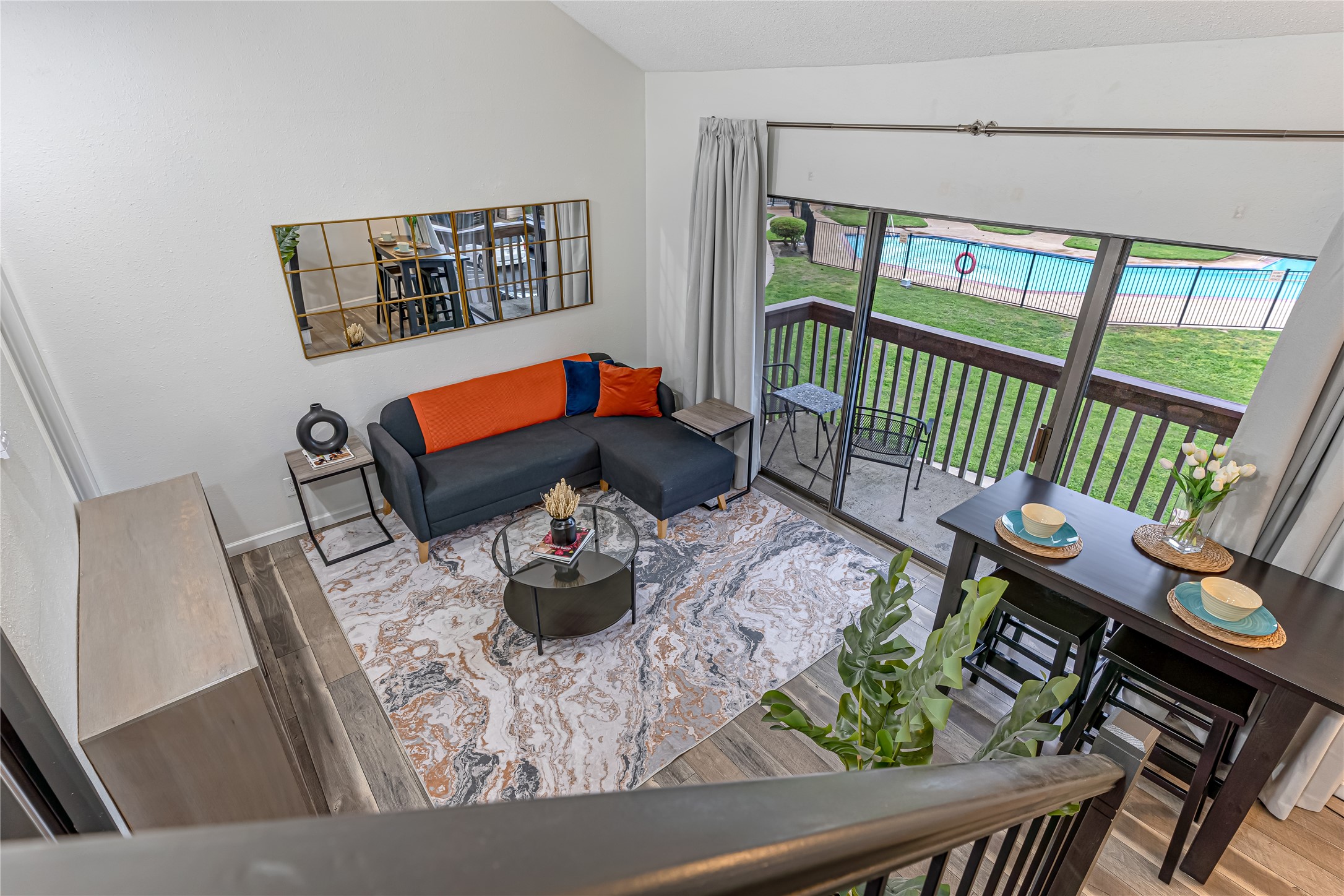 12900 Walden Road, Unit 502E Montgomery, TX 77356 - Photo 10 of 31 a living room with furniture and a window