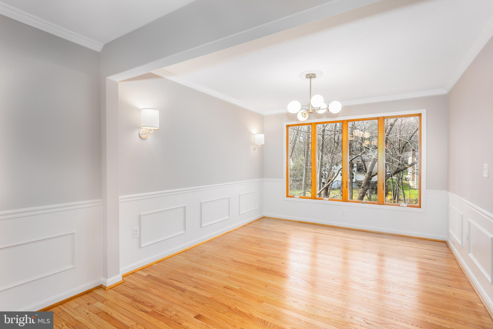 2212 Blue Valley Drive Silver Spring, MD 20904 - Photo 12 of 61 an empty room with wooden floor and windows