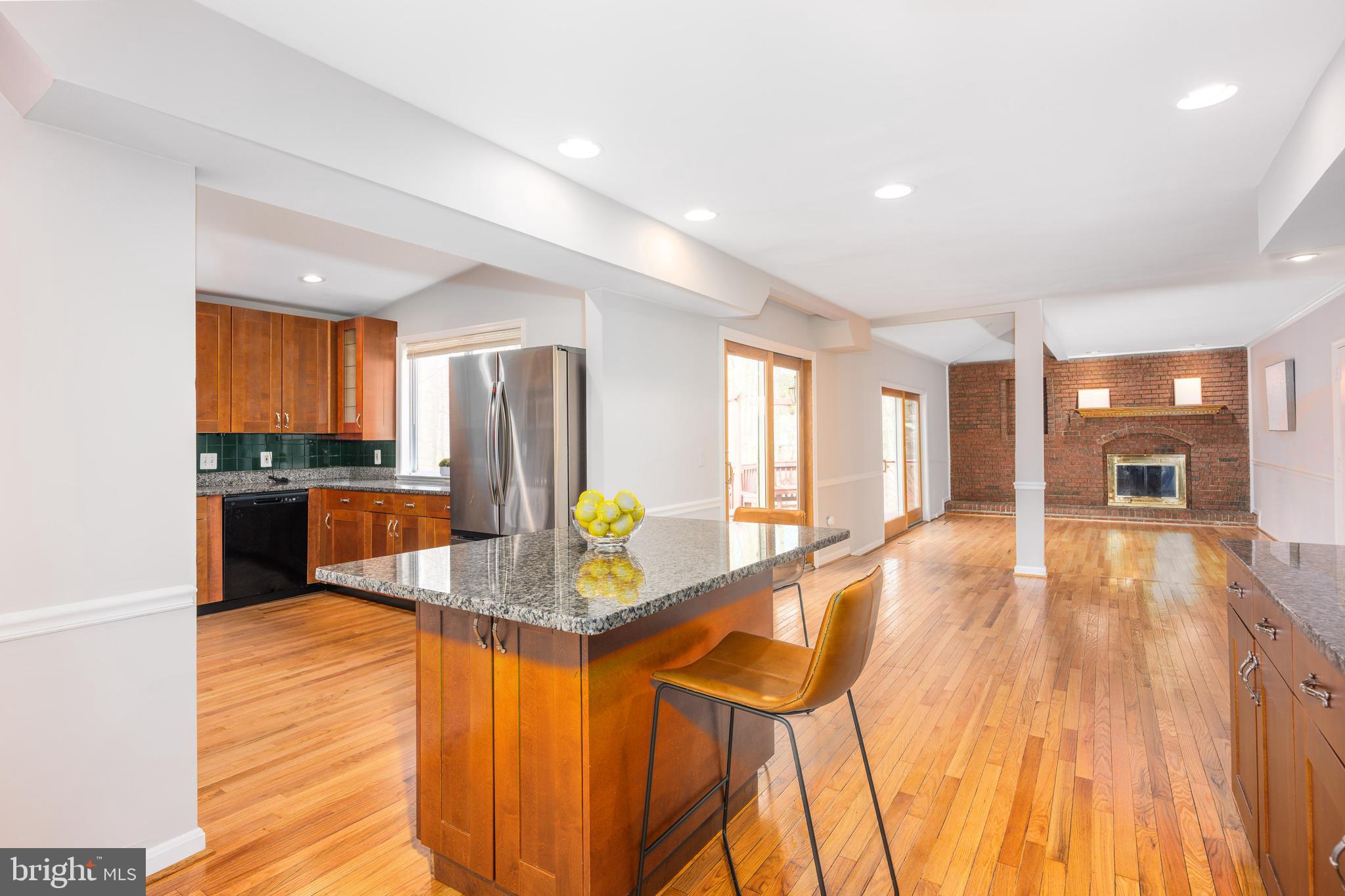 2212 Blue Valley Drive Silver Spring, MD 20904 - Photo 24 of 61 a large kitchen with granite countertop a large counter top stainless steel appliances and cabinets